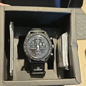 OMEGA x SWATCH MISSION TO THE MOONPHASE SPEEDMASTER SNOOPY WATCH.